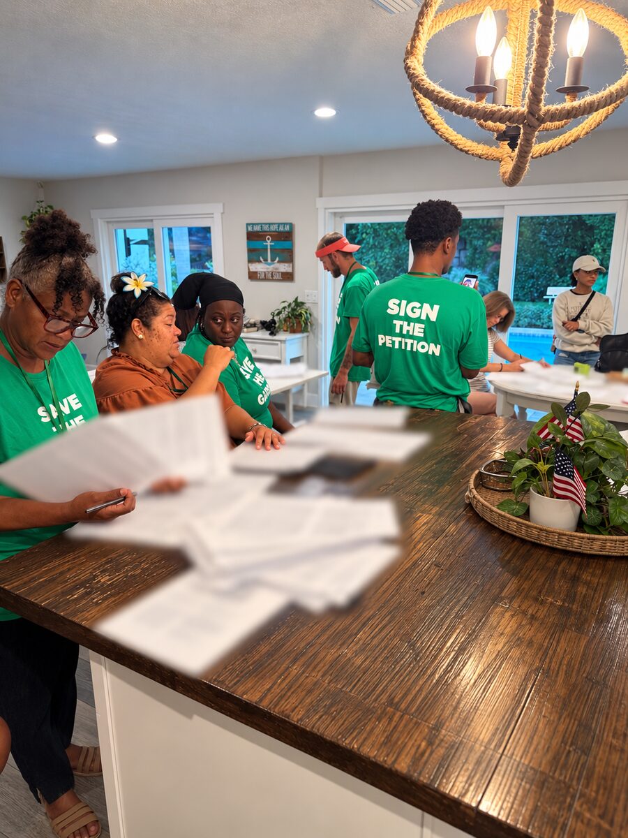 Outreach team members reviewing paperwork together